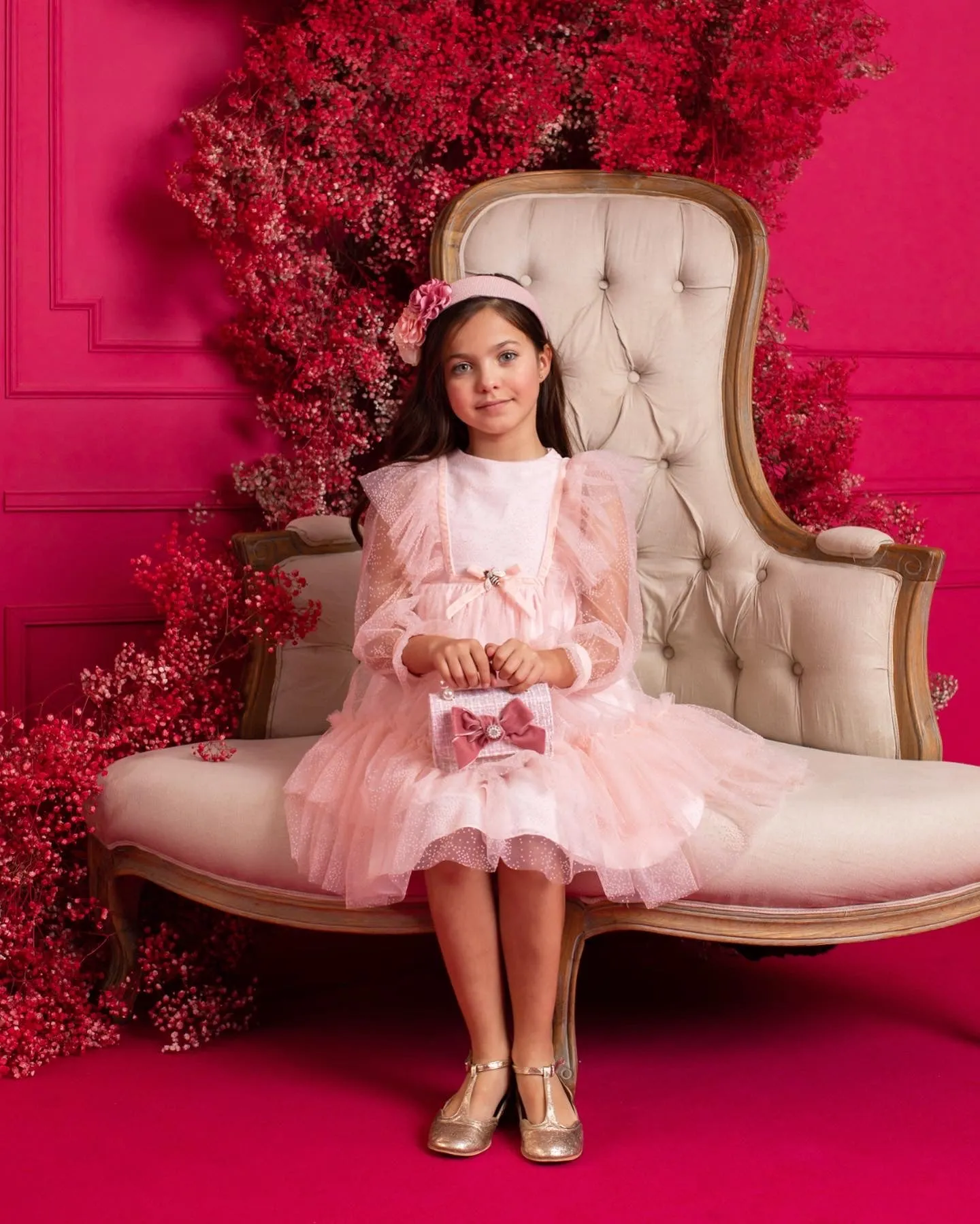 Beautiful Pink chiffon dress with ruffle and Bow details.